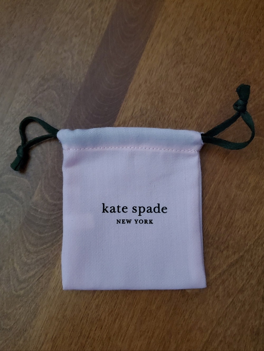 kate spade Pink Drawstring Jewelry Pouch with Green Cords